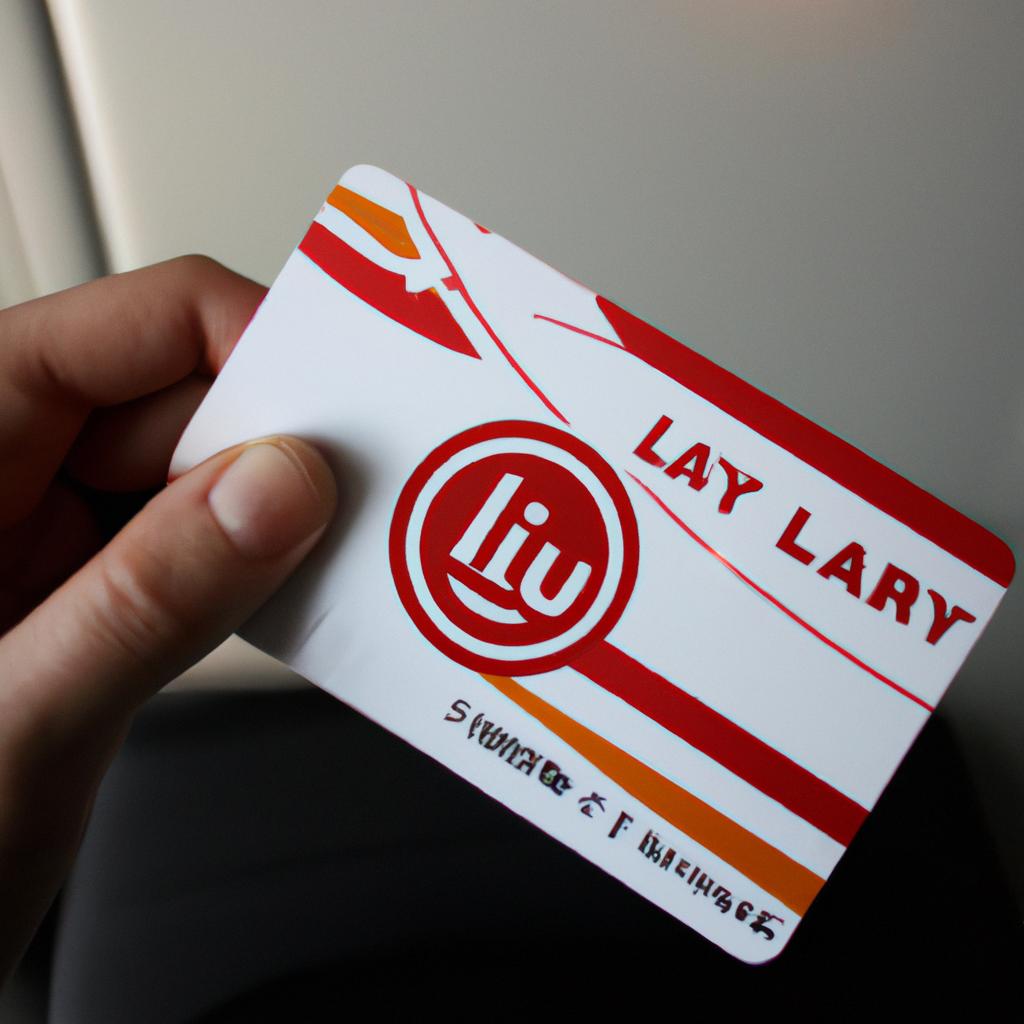 Person holding airline loyalty card