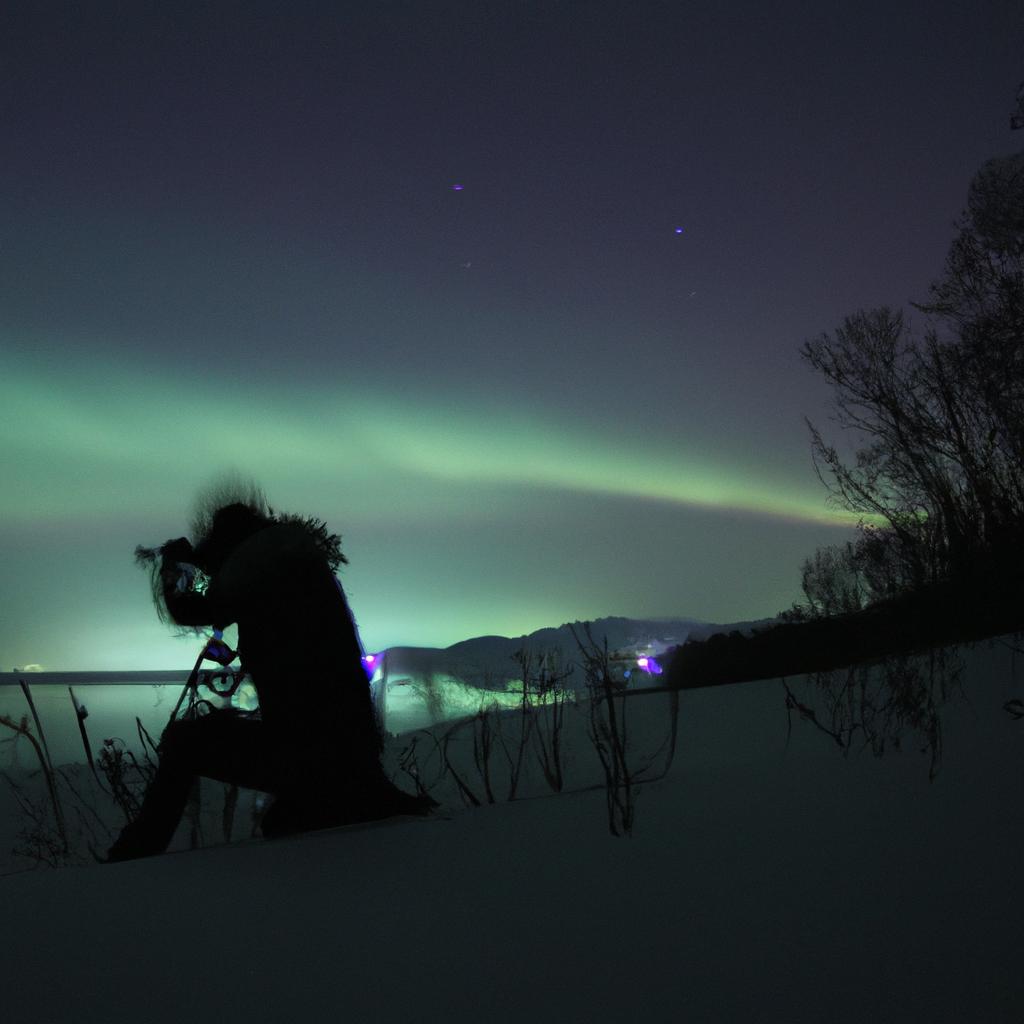 Person photographing Northern Lights in Hokkaido