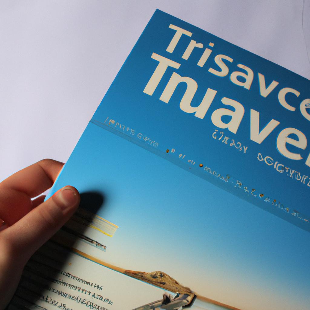 Person holding travel insurance brochure